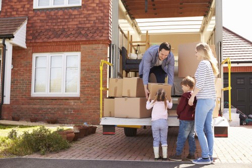 Flat removals planning in Brompton with moving boxes and apartment access